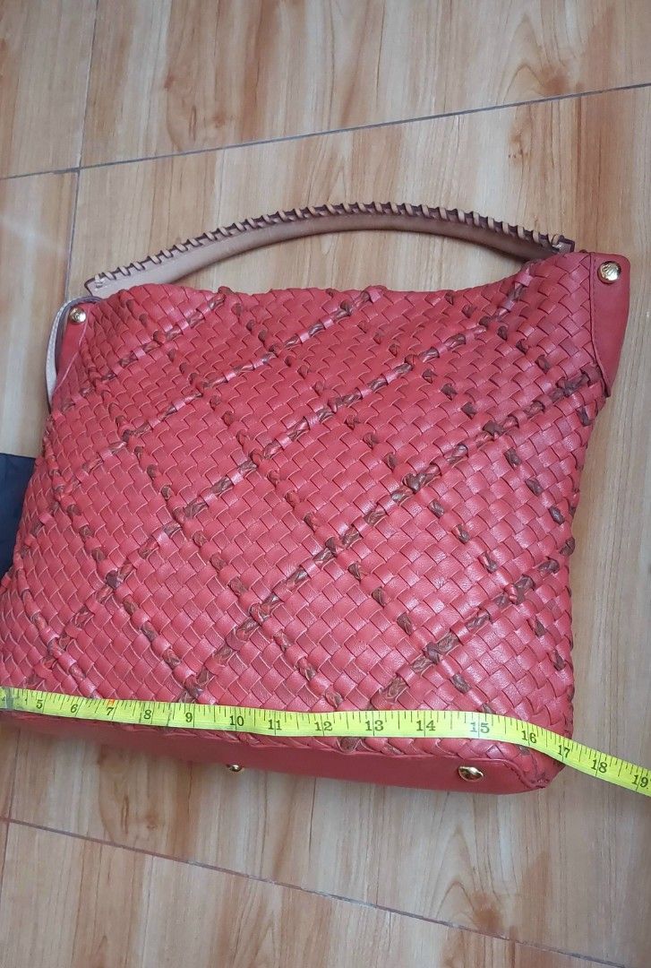 Renoma Woven Hobo bag (Category: Luxury Bags & Wallets) located in Davao. Submitted by wengbagstuff (Listing ID 1467722329, Image 3). Description: ✅️ genuine leather ✅️ almost new condition ✅️ woven hobo style in red color ✅️ semi-large size with wallet attached ✅️ sturdy .