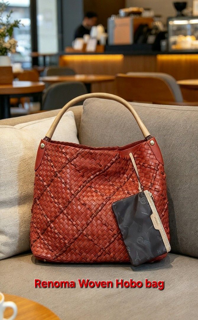 Renoma Woven Hobo bag (Category: Luxury Bags & Wallets) located in Davao. Submitted by wengbagstuff (Listing ID 1467722329, Image 1). Description: ✅️ genuine leather ✅️ almost new condition ✅️ woven hobo style in red color ✅️ semi-large size with wallet attached ✅️ sturdy .