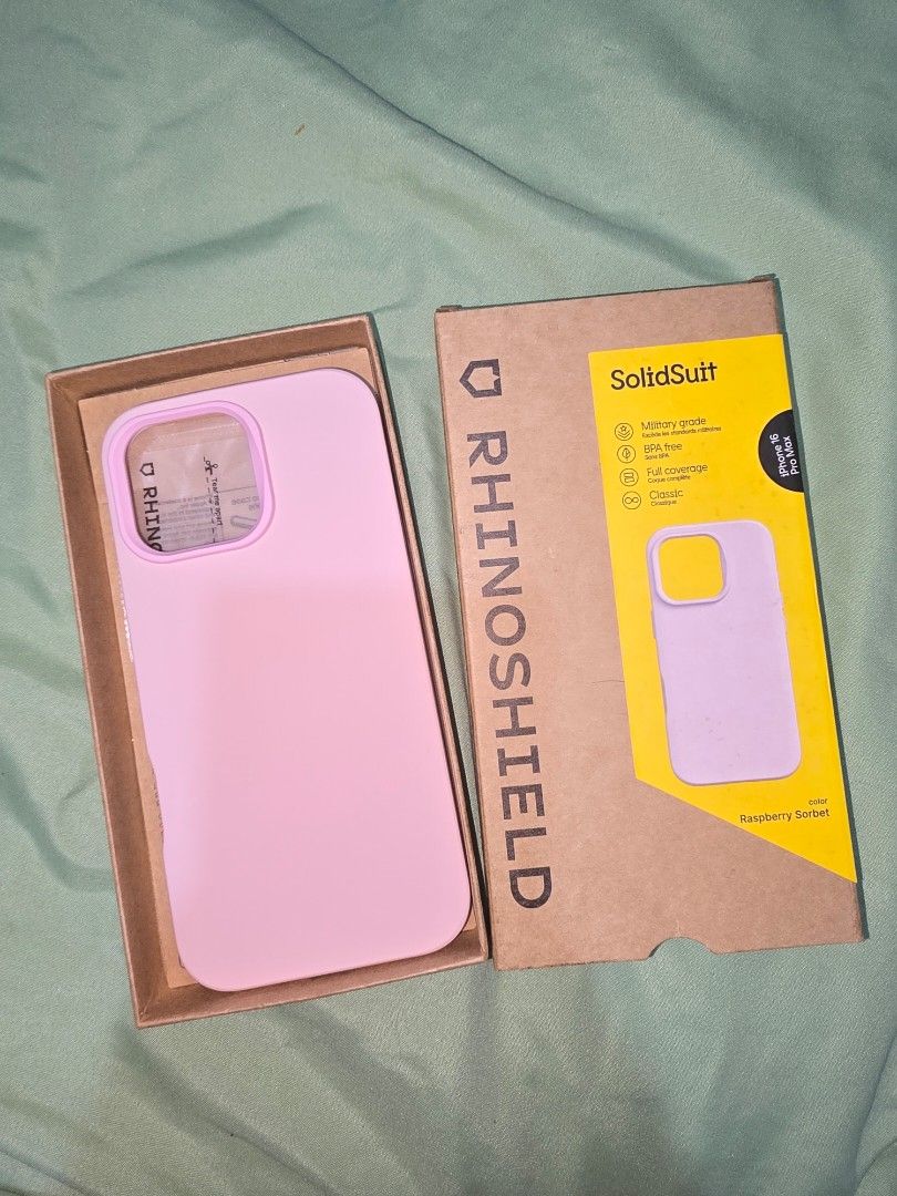 Rhinoshield SolidSuit for 16 Pro Max (BN) (Category: Cases & Sleeves) located in Marikina City. Submitted by meandmyprelovedstuff (Listing ID 1467776846, Image 1). Description: - Brand: RhinoShield SolidSuit - Compatibility: iPhone 16 Pro Max - Color: Raspberry Sorbet (Soft Pink) - Condition: Brand New (comes with original box) - Key Features: Military-grade drop protection, BPA-free material, inner honeycomb structure for shock absorption - Meet