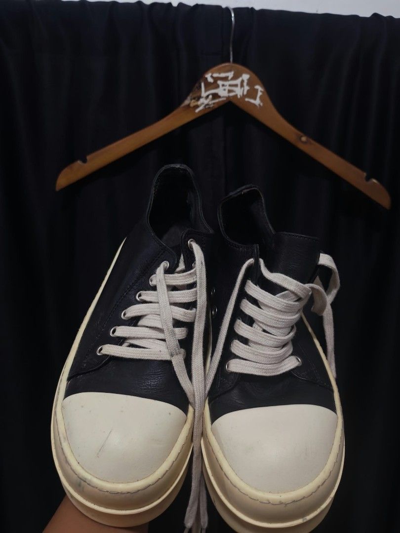 Rick Owens Platform Sneaker Black White Size 36 (Category: Sneakers) located in Baguio. Submitted by solo_ukay (Listing ID 1467788476, Image 1). Description: Black leather uppers with thick off-white platform soles. Classic Rick Owens bumper toe design. Cream laces laced through metal eyelets. Stamped branding on the thick treaded outsoles. Inner size tag reads 36, made in Italy. Shows scuffs on the toe caps and sides of the midsoles from regular