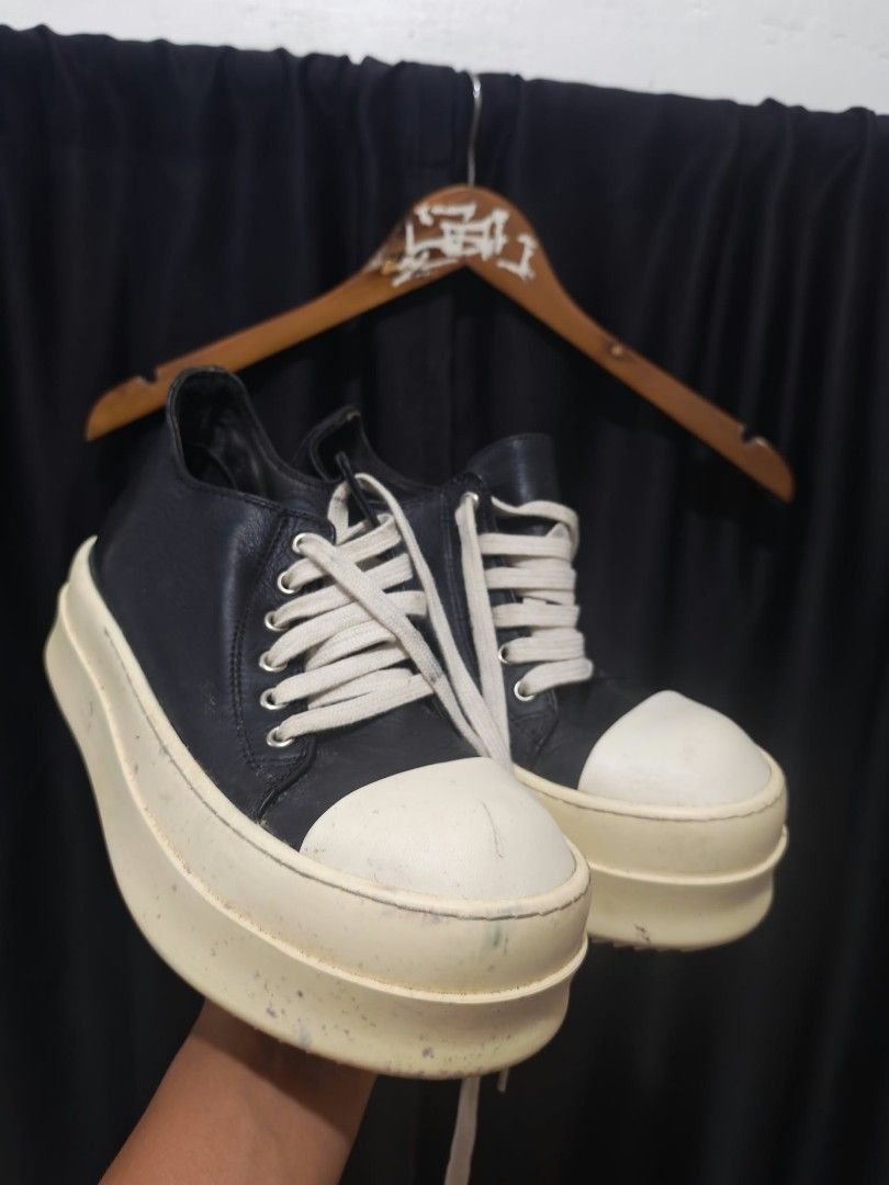 Rick Owens Platform Sneaker Black White Size 36 (Category: Sneakers) located in Baguio. Submitted by solo_ukay (Listing ID 1467788476, Image 2). Description: Black leather uppers with thick off-white platform soles. Classic Rick Owens bumper toe design. Cream laces laced through metal eyelets. Stamped branding on the thick treaded outsoles. Inner size tag reads 36, made in Italy. Shows scuffs on the toe caps and sides of the midsoles from regular