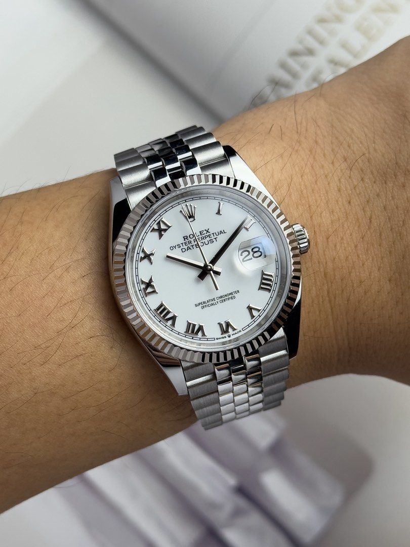 Rolex Datejust 36 White Roman (Category: Luxury Watches) located in Cebu City. Submitted by pcantillas (Listing ID 1467682487, Image 2). Description: Rolex Datejust 36 White Roman Dial Fluted Jubilee 126234 36mm 2023 Condition: 9/10 (Excellent condition) Price: P658,000 Negotiable 🤝 7 Day Moneyback Guarantee 🧑‍🔧 1 Year SP Service Warranty 💱 Trades Offers and Pre-orders Accepted 💳 Credit Card Options Available 🪙 Layaway Options Available 📦 