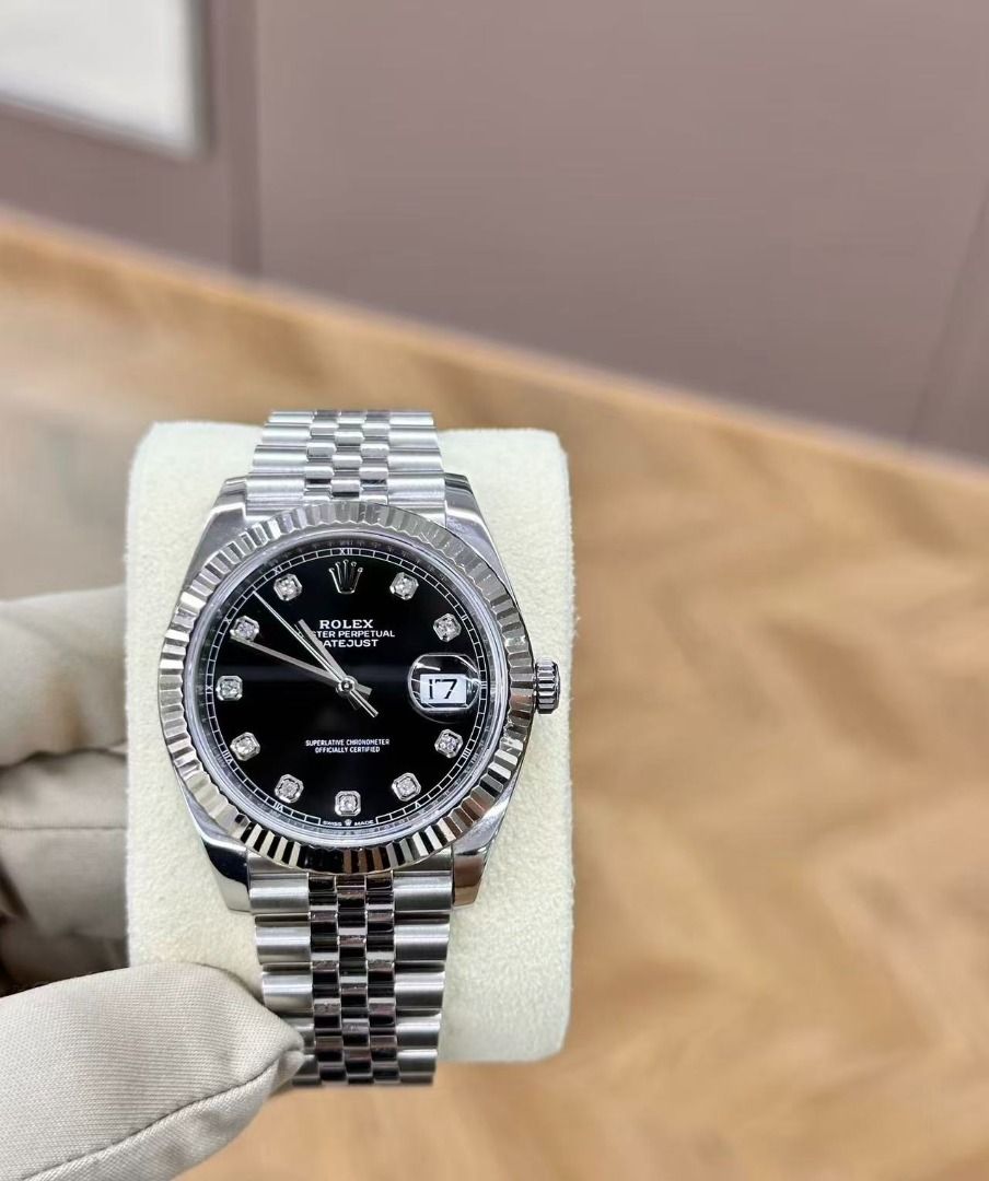 Rolex Datejust Black Diamond Dial Jubilee Bracelet (Category: Luxury Watches) located in Taguig. Submitted by ivelyskura42711 (Listing ID 1467698421, Image 3). Description: - Model: Rolex Datejust - Dial: Black with diamond hour markers - Bezel: Fluted silver-tone - Bracelet: Five-piece Jubilee - Movement: Automatic with date window and cyclops lens - Condition/Style: Classic luxury timepiece, ideal for timeless daily wear.