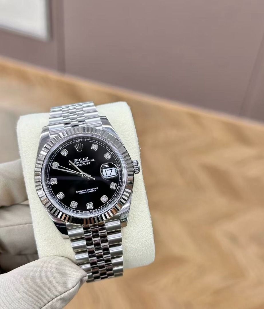 Rolex Datejust Black Diamond Dial Jubilee Bracelet (Category: Luxury Watches) located in Taguig. Submitted by ivelyskura42711 (Listing ID 1467698421, Image 2). Description: - Model: Rolex Datejust - Dial: Black with diamond hour markers - Bezel: Fluted silver-tone - Bracelet: Five-piece Jubilee - Movement: Automatic with date window and cyclops lens - Condition/Style: Classic luxury timepiece, ideal for timeless daily wear.