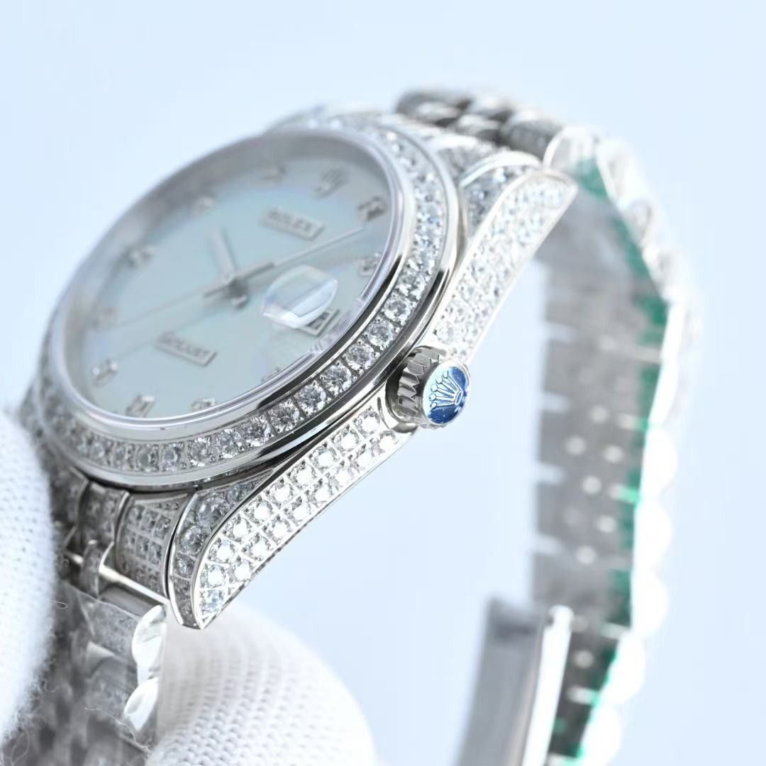 Rolex Datejust Diamond Pave Rainbow Dial Watch (Category: Luxury Watches) located in Quezon City. Submitted by reifancova27621 (Listing ID 1467703652, Image 3). Description: - Model: Rolex Datejust - Setup: Full diamond-pave iced out bezel, case, lugs, and jubilee bracelet - Dial: Mother of pearl rainbow dial with diamond hour markers and 3 o'clock date window - Condition: Brand new with factory plastic wrap still attached on the bracelet - Movem