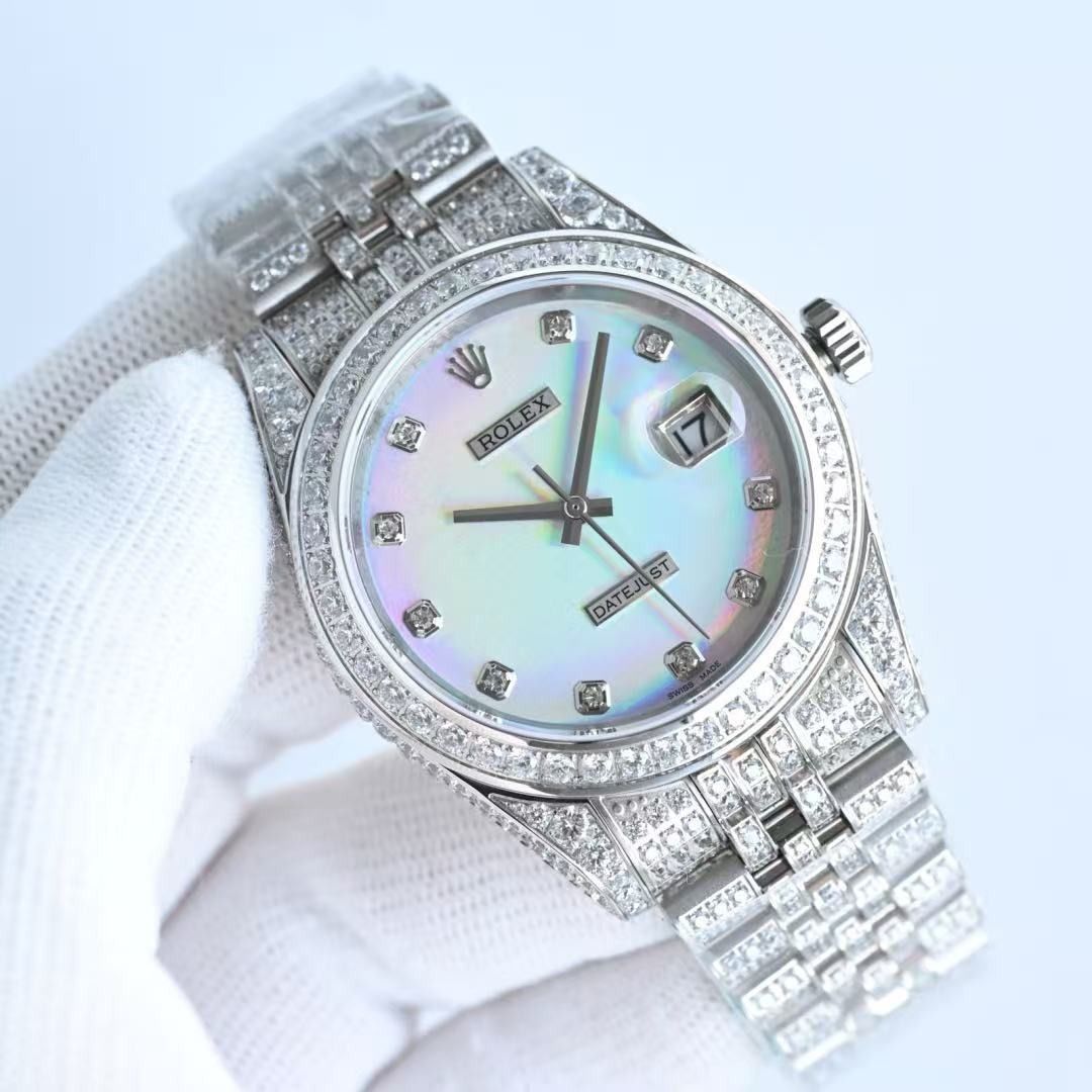 Rolex Datejust Diamond Pave Rainbow Dial Watch (Category: Luxury Watches) located in Quezon City. Submitted by reifancova27621 (Listing ID 1467703652, Image 2). Description: - Model: Rolex Datejust - Setup: Full diamond-pave iced out bezel, case, lugs, and jubilee bracelet - Dial: Mother of pearl rainbow dial with diamond hour markers and 3 o'clock date window - Condition: Brand new with factory plastic wrap still attached on the bracelet - Movem