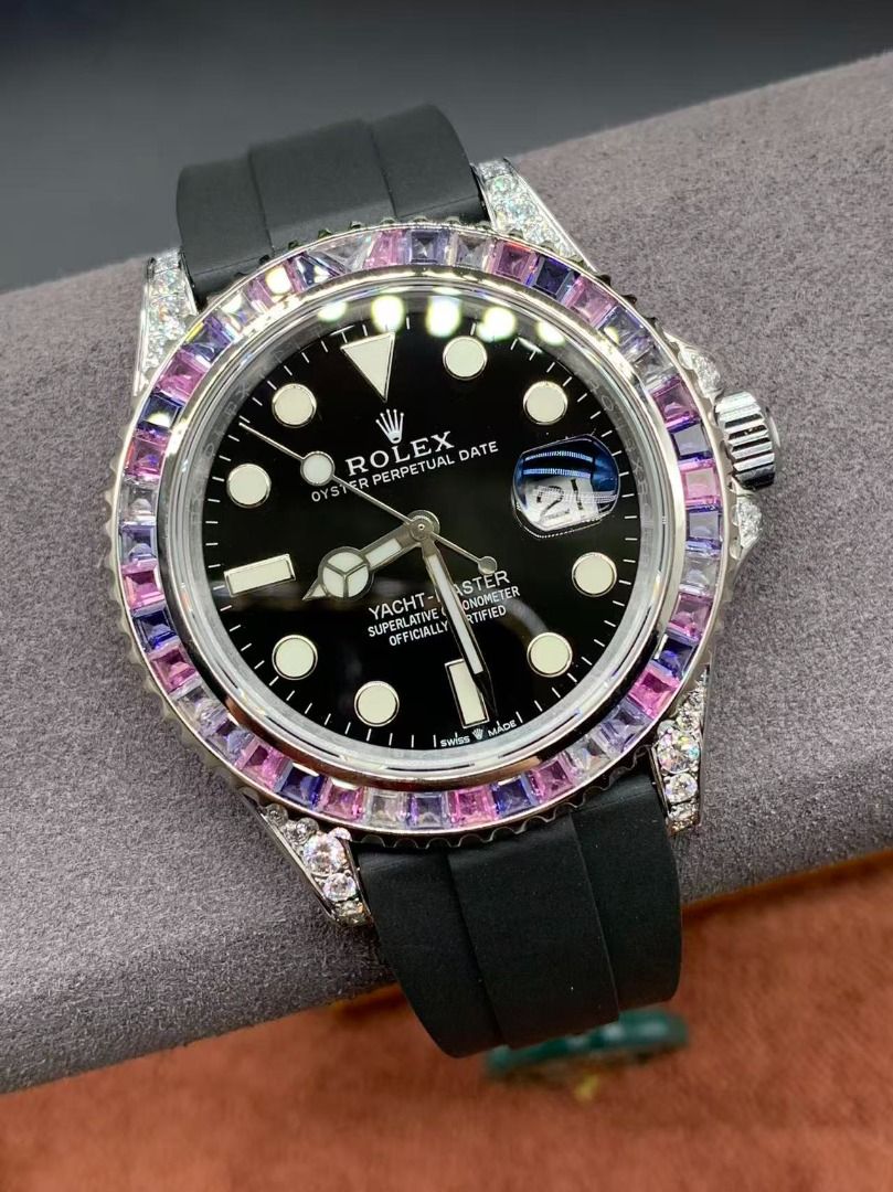 Rolex Yacht-Master Custom Diamond Sapphire Black Dial Rubber Strap (Category: Luxury Watches) located in Mandaluyong City. Submitted by slyvkaespe03655 (Listing ID 1467663103, Image 2). Description: - Custom Rolex Yacht-Master watch - Black dial with round hour markers and 3 o'clock date window - Eye-catching multi-color sapphire gemstone bezel - Diamond-set lugs and crown guards for added luxury - Durable black rubber strap with deployment clasp