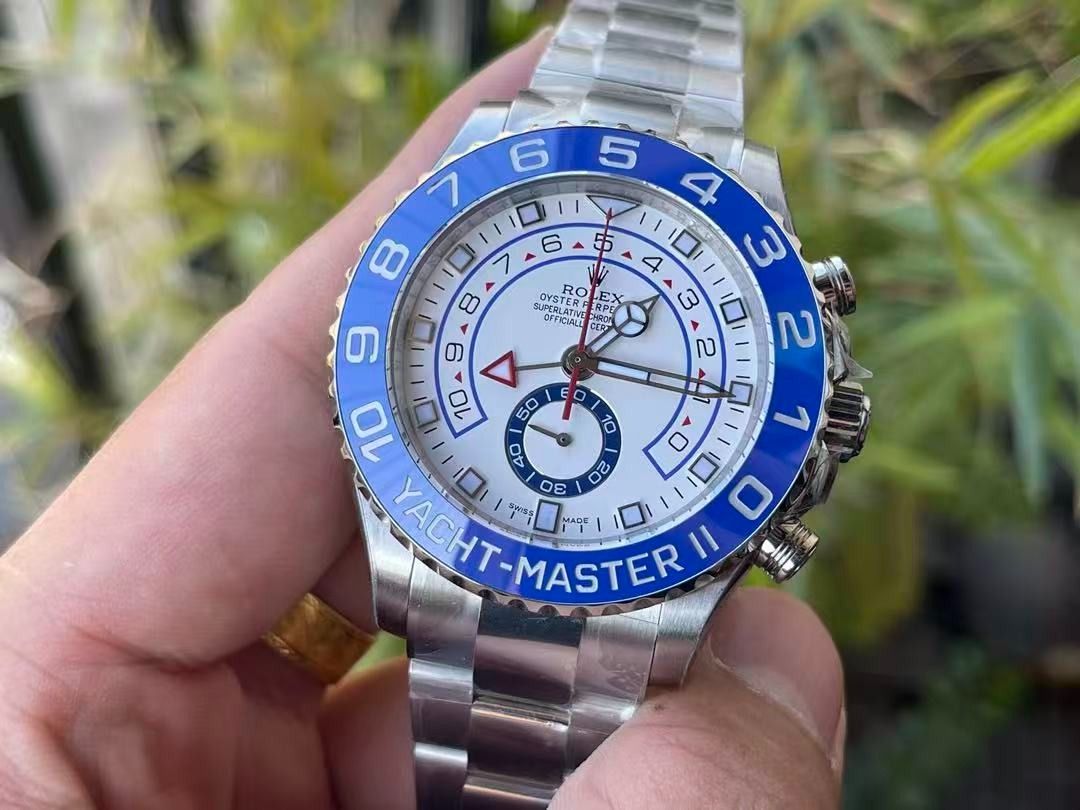 Rolex Yacht-Master II White Dial Blue Bezel (Category: Luxury Watches) located in Mandaluyong City. Submitted by sadihaviur09733 (Listing ID 1467682900, Image 2). Description: Rolex Yacht-Master II. White dial with striking blue rotating bezel and stainless steel Oyster bracelet. Chronograph layout with countdown timer functionality and distinct red hand. Protective plastic wrapping still intact on the case and strap links. Solid steel caseback w