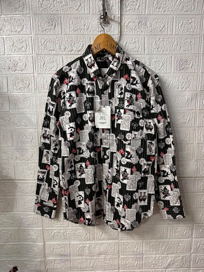 ROVSTKI - all over printed shirt (Category: Activewear) located in Bacoor. Submitted by arlenelamery (Listing ID 1467707476, Image 2). Description: ROVSTKI - ALL OVER PRINT SHIRT, ALICE AND WONDERLAND,PLAYING CARD MADE IN JAPAN 🇯🇵 BRANDNEW WITH HANGTAG AUTHENTIC NO ISSUE SIZE MEDIUM SIZE ACTUAL VIA TAPE MEASURE W20 PIT TO PIT L28 SLEEVE 23 SHOULDER 18 PRICE 1500 + SF PM MODE OF PAYMENT TRU GCASH LOC CAVITE.