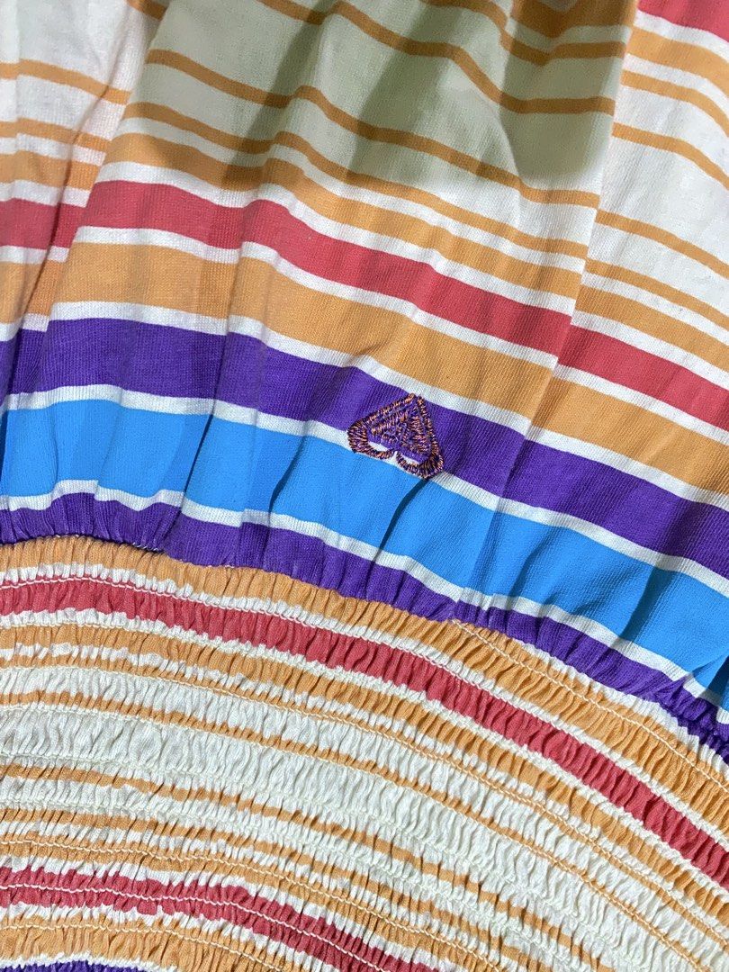 Roxy Striped Strapless Dress Size XS (Category: Dresses) located in Manila. Submitted by jaythrifttz (Listing ID 1467767799, Image 3). Description: Super cute Roxy multicolor striped strapless dress in size XS. Features a comfy smocked waist, sweetheart neckline, and a sweet embroidered heart logo. Perfect for sunny days and beach trips!.