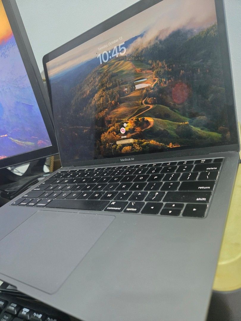 RUSH MacBook Air 13-inch 2019 (Category: Laptops & Notebooks) located in Cavite. Submitted by margoqq (Listing ID 1467765327, Image 2). Description: RUSH - LAST PRICE POSTED UNIT SOLD AS IS, 100% WORKING Battery lasts 2-3 hrs (was used for work as VA) - Model: MacBook Air 2019 (13-inch) - Color: Sleek Space Grey - Processor: 1.6 GHz Intel Core i5 - Memory: 8GB RAM - Graphics: Intel UHD Graphics 617 - OS: Updated to macOS Sonoma - Condition: Norma