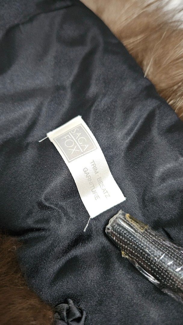 Saga Fox Fur Collar Trim Scarf (Category: Scarves) located in Alfonso. Submitted by jbcamet (Listing ID 1467710814, Image 2). Description: - 100% Genuine Saga Fox fur collar trim - Gorgeous silver fox coloration with long, fluffy guard hairs - Premium black satin lining on the reverse side - Convenient zipper attachment mechanism and original tag included - Instantly upgrades plain parkas or jacket hoods for maximum warmth and style.