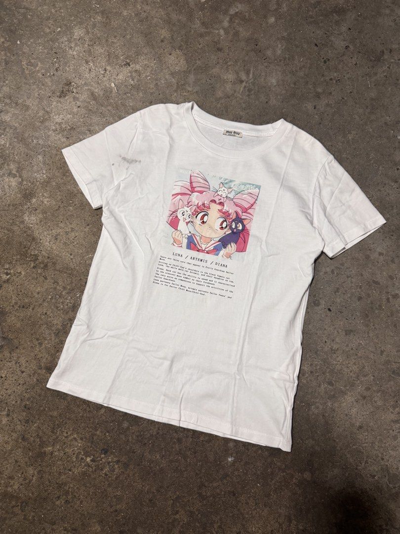 Sailor Moon Miu Miu (Category: Shirts) located in Pasig City. Submitted by dripthrift1600 (Listing ID 1467744450, Image 1). Description: - Miu Miu Sailor moon - Good Condition - Needwash - Issue: Stain - sizes: S - Dimes: 17x23.