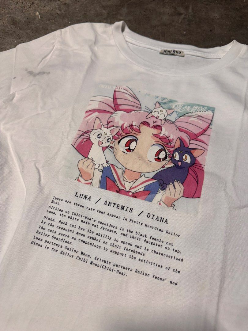 Sailor Moon Miu Miu (Category: Shirts) located in Pasig City. Submitted by dripthrift1600 (Listing ID 1467744450, Image 3). Description: - Miu Miu Sailor moon - Good Condition - Needwash - Issue: Stain - sizes: S - Dimes: 17x23.