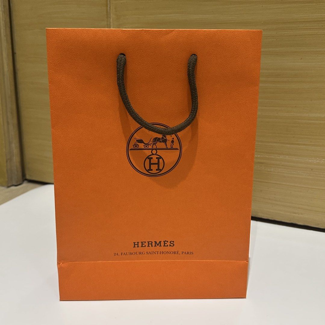 Saint honore Paris exclusive Hermes small paperbag (Category: Luxury Bags & Wallets) located in Quezon City. Submitted by timelessfinds (Listing ID 1467775103, Image 1). Description: Rare only in paris saint honore store.