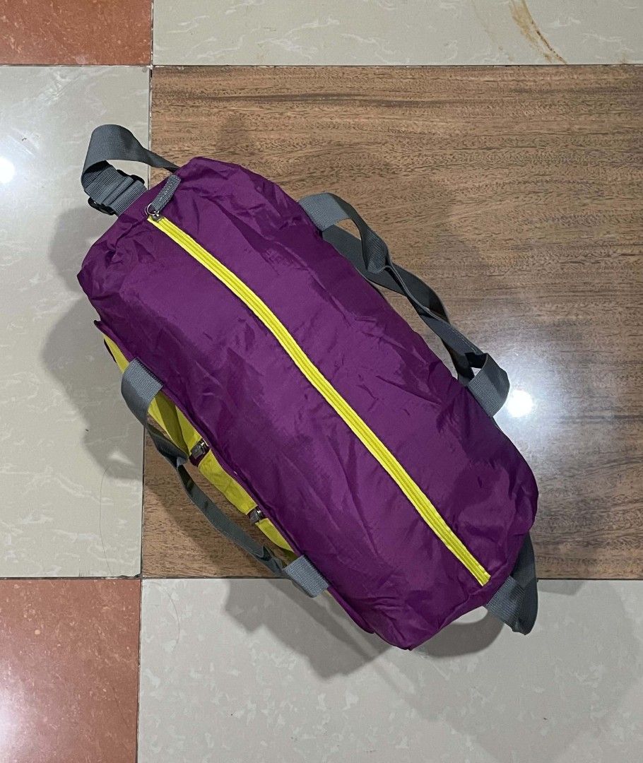 Salomon Packable Duffel Bag (Category: Sling Bags) located in Bacolod City. Submitted by abkicks_apparel (Listing ID 1467786575, Image 3). Description: Salomon Packable Duffel Bag 25 to 30 Liters Capacity 28cm x 50cm Dimensions Multiple Compartments Authentic Original As New Condition No Hidden Issues Pm.