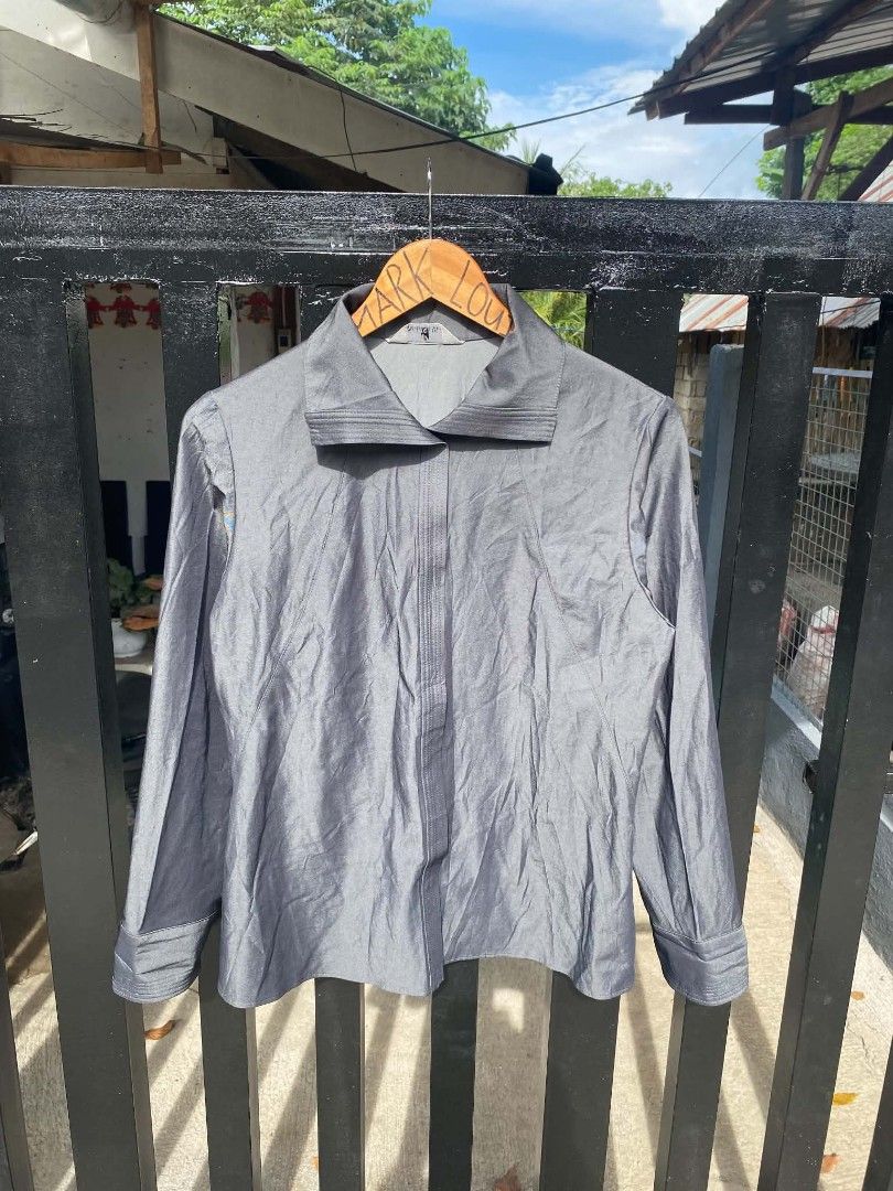 Samsara Gray Long Sleeve Button-Up Blouse (Category: Longsleeves) located in Manila. Submitted by louiseluch69680 (Listing ID 1467661241, Image 1). Description: - Brand: Samsara - 🇯🇵 made in Japan - Color: Gray - dimes 19.3x25.5 back 23 - Style: Long sleeve blouse with structured lapel collar - Details: Hidden button placket, button cuffs, and paneled stitching - Fabric: Smooth and comfortable - Condition: excellent, no issue and Great basic pi