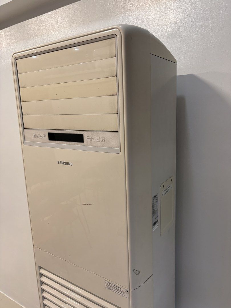 Samsung 4HP Floor Standing Air Conditioner (Category: Air Conditioning and Heating) located in Rizal. Submitted by bfintal (Listing ID 1467625801, Image 2). Description: Samsung 4HP floor-standing air conditioner. Samsung floor standing air conditioner unit, model AP36M0AN. Capacity 38,000 kJ/h, 230V, 60Hz. Includes indoor tower unit and outdoor compressor unit. White casing with digital display panel. Some cosmetic scuffs and dust accumulation o