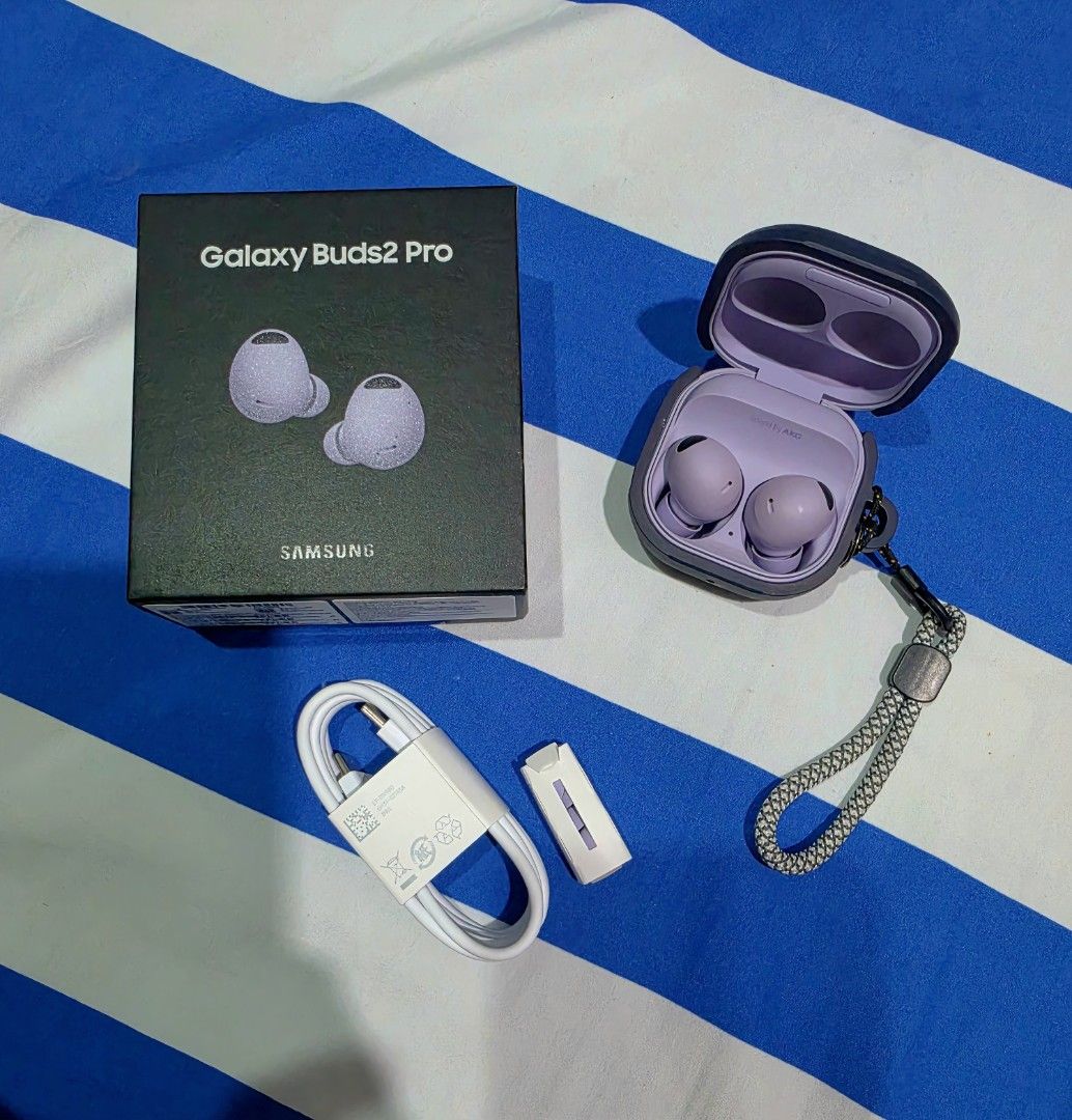 Samsung Galaxy Buds2 Pro Purple (Category: Earphones) located in Guinobatan. Submitted by mayrell128 (Listing ID 1467715592, Image 1). Description: - Model: Samsung Galaxy Buds2 Pro - Color: Bora Purple - Condition: Fully functional and well-kept - Inclusions: Original retail box, unused USB-C cable, and unused extra silicone tips - Freebie: Ringke Dark protective case with braided wrist lanyard - Deal: Ready for quick transaction -Negotiable.