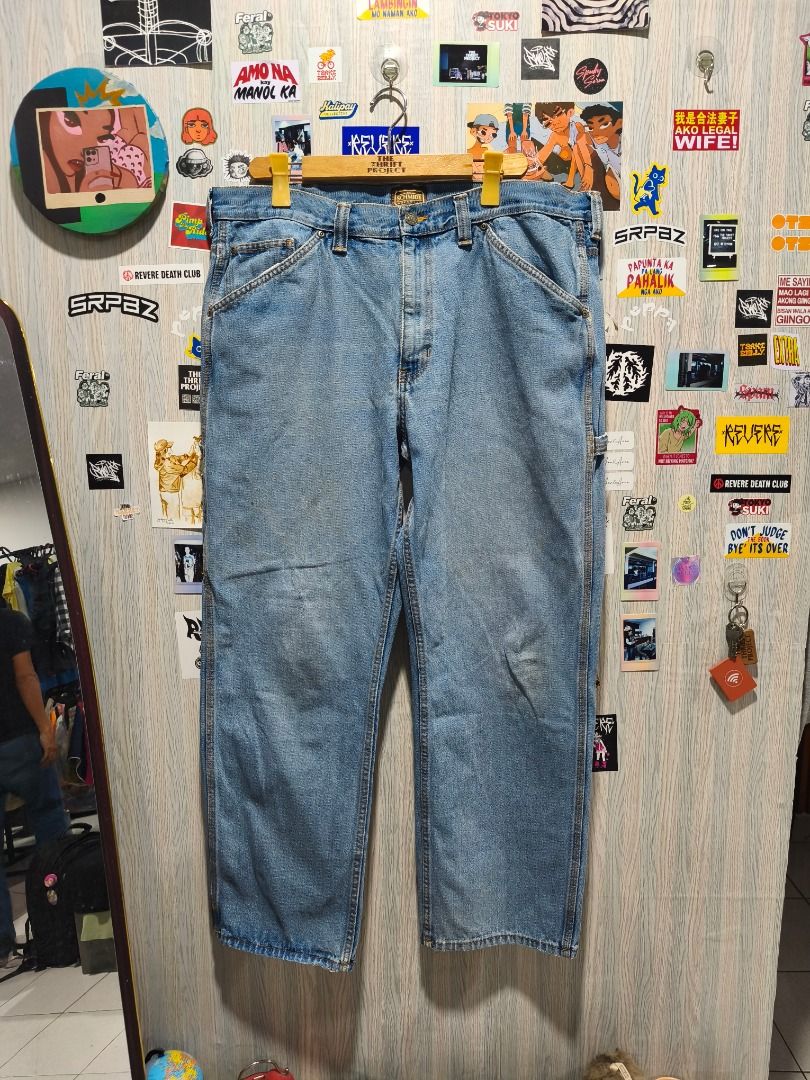Schmidt Vintage Light Wash Denim Carpenter Jeans (Category: Jeans) located in Davao. Submitted by thethriftproject082 (Listing ID 1467796065, Image 2). Description: CE Schmidt Light Wash Carpenters 📍𝐌𝐈𝐍𝐄: 650 📍𝐒𝐈𝐙𝐄 𝐎𝐍 𝐓𝐀𝐆: 40 Waist 📍𝐃𝐈𝐌𝐄𝐒: 40 waist x 43 Length - Brand: Schmidt - Style: Relaxed fit light wash denim carpenter jeans - Details: Utility pockets, hammer loop, and leather brand patch on the back waistband - Material