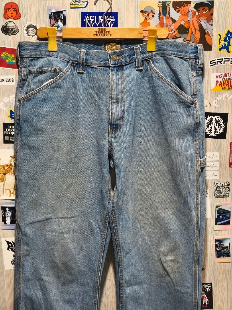 Schmidt Vintage Light Wash Denim Carpenter Jeans (Category: Jeans) located in Davao. Submitted by thethriftproject082 (Listing ID 1467796065, Image 3). Description: CE Schmidt Light Wash Carpenters 📍𝐌𝐈𝐍𝐄: 650 📍𝐒𝐈𝐙𝐄 𝐎𝐍 𝐓𝐀𝐆: 40 Waist 📍𝐃𝐈𝐌𝐄𝐒: 40 waist x 43 Length - Brand: Schmidt - Style: Relaxed fit light wash denim carpenter jeans - Details: Utility pockets, hammer loop, and leather brand patch on the back waistband - Material
