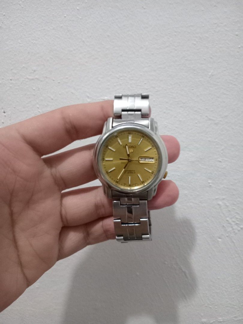 Seiko 5 gold dial (Category: Men's Watches) located in Taguig. Submitted by nippon.toki (Listing ID 1467774233, Image 2). Description: Please read! For sure buyer only! NO COD/COP No reservation The items will be sold to the first payer w/o prior notice. Verbal reservations are not acceptable. Note: All items are vintage. Please manage your expectations accordingly. G cash payment. Shipping via Lalamove Metro Manila. For province: J and T Shippin