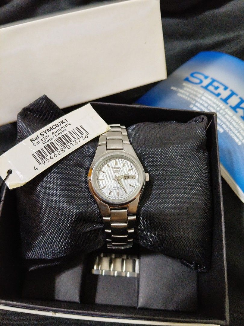 Seiko Automatic for Ladies (Category: Women's Watches) located in Manila. Submitted by zencat_c156a7 (Listing ID 1467607799, Image 1). Description: Seiko Automatic for Ladies ✨ Rare piece 🚨 White textured salmon dial (used) SYMC07K1 28mm Automatic 21 jewels Complete inclusions: box, warranty card, and manual, hangtag included, and complete links plus with original price tag NEGOTIABLE issue: some scratches.
