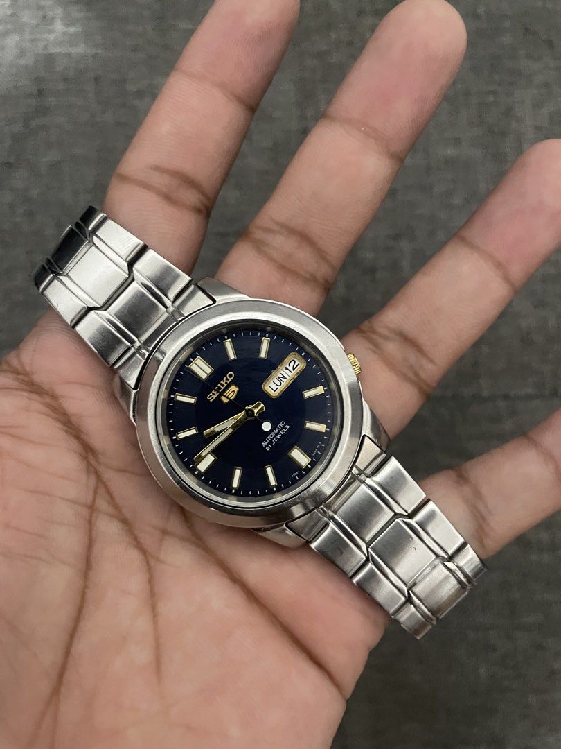 Seiko SNKL79K1 Automatic (Category: Men's Watches) located in Las Pinas. Submitted by jhersan24 (Listing ID 1467604605, Image 2). Description: Seiko SNKL79K1 Automatic Dial: Sunburst Blue & Gold Tone Hands Movement: 7s26 (Open Back) Diameter: 38mm Condition: 10/10 Inclusion: Replacement Box Price: Slightly Negotiable Loc: Manuyo Dos, Las Piñas/ Pasay, Moa.