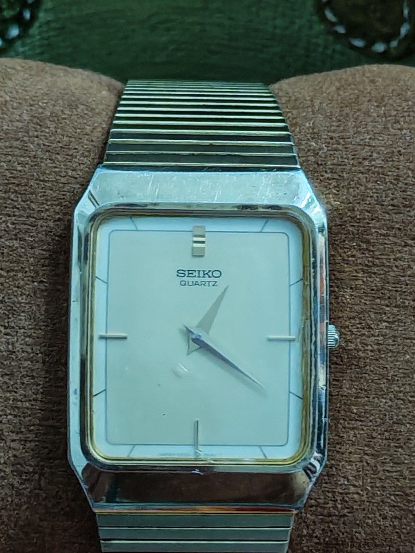 Seiko Tank Quartz (Gold Tone) (Category: Men's Watches) located in Trece Martires City. Submitted by heirloomhoursph (Listing ID 1467646299, Image 3). Description: ✨ Heirloom Hours – Available Piece ✨ Seiko Tank Quartz (Gold Tone) Php 6,999 + sf Details: ■ Brand/Series: Seiko ■ Model Number: 5P30-5D50/676266 ■ Movement: Quartz ■ Design Origin: Japan ■ Case Size: 27mm ■ Wrist Size: 20cm (max) ■ Condition: 9/10 (issue strap) ■ Comes with replacemen