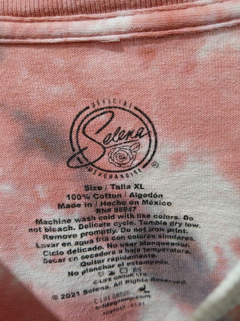 Selena (Tie Dye) (Category: Tshirts & Polo Shirts ) located in Taguig. Submitted by thriftedminds (Listing ID 1467703658, Image 3). Description: Item: Selena Tie Dye🔥 ‎Size: XLarge (Selena with White Cut Tag ) ‎Width: 21.5 ‎Length: 27.5 ‎Condition: Excellent ‎Issue: Pinhole, Crack print, Loose stitching on Sleeve DM to purchase 📩.