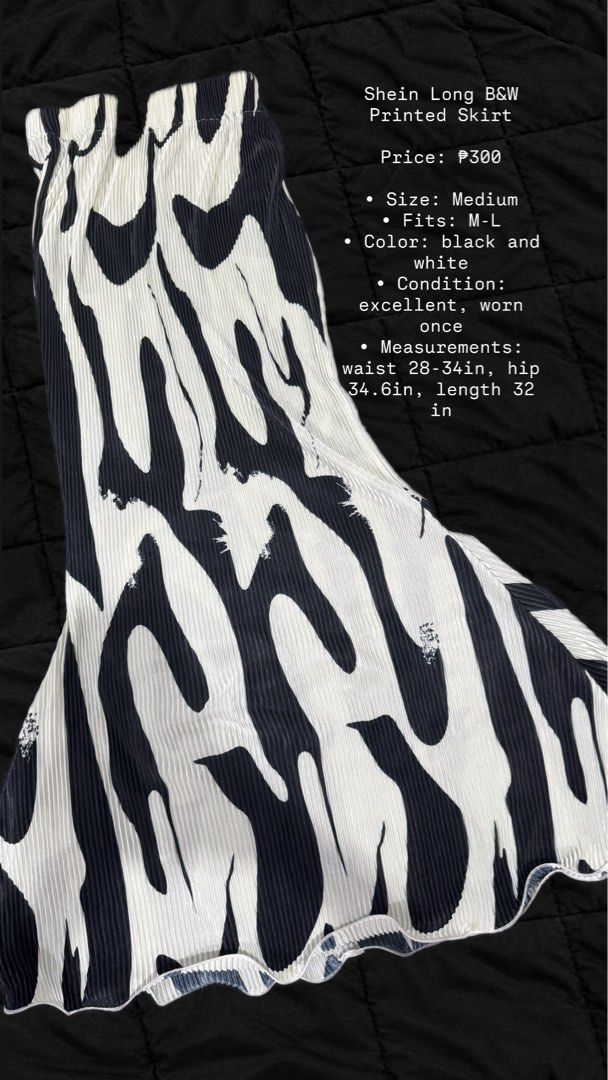 Shein Long B&W Printed Skirt (Category: Skirts) located in Las Pinas. Submitted by prelovedgoodiesph (Listing ID 1467723865, Image 1). Description: - Brand: Shein - Design: Black and white graphic pattern - Size: Medium (stretches to fit Large) - Measurements: Waist 28-34" | Hips 34.6" | Length 32".
