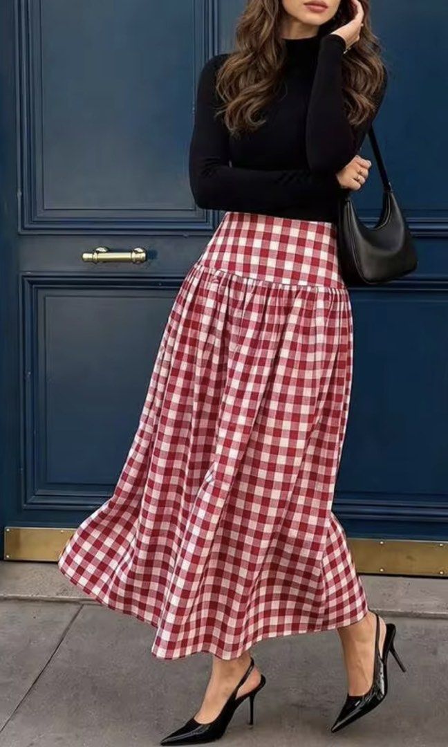 Shein Red Gingham Plaid Maxi Skirt (Category: Skirts) located in Manila. Submitted by backupaccount2 (Listing ID 1467785252, Image 2). Description: - Style: Red and white gingham plaid midi skirt - Fit: High waist with a gathered yoke and flared design - Closure: Easy back zipper - Perfect for: Picnic dates and casual chic looks - Styling tip: Pairs wonderfully with a simple black turtleneck.