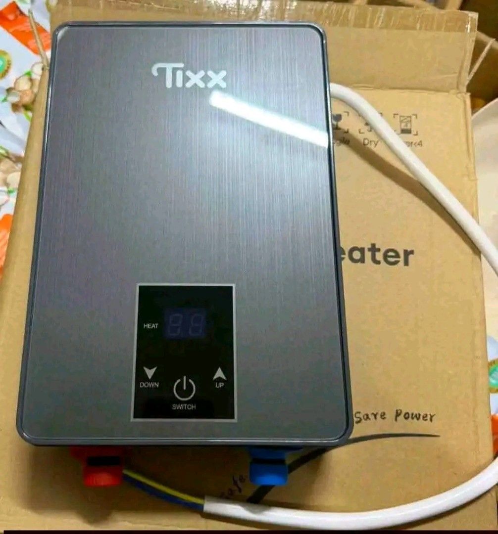 Shower Water Heater (Category: Water Heater & Instant Showers) located in Manila. Submitted by antique_15 (Listing ID 1467647318, Image 2). Description: Tixx Brand-new Water Heater ₱1509.