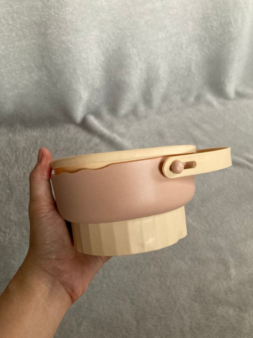 Silicone Makeup Brush Cleaner Folding Bowl (Category: Makeup) located in Rizal. Submitted by sheeraay (Listing ID 1467706031, Image 1). Description: - Color: Pink and beige - Material: Flexible silicone - Textured base with multi-pattern design for deep cleaning various brush sizes - Collapsible design folds flat for compact storage and travel - Handy side handle for easy grip and control - Quick and efficient way to wash your makeup brushes.