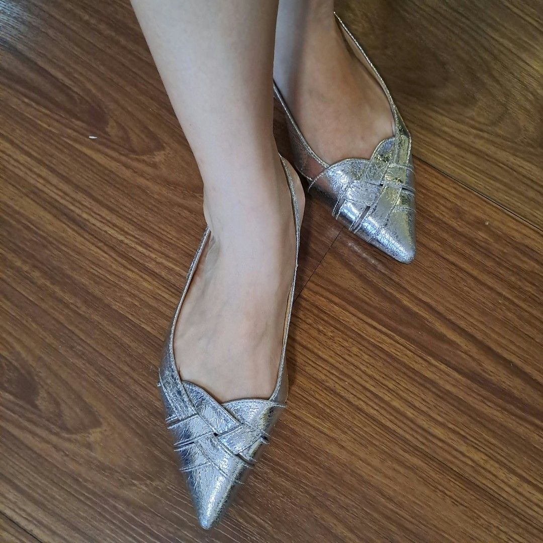 Silver ballet flats (Category: Flats & Sandals) located in Manila. Submitted by moccayap23686 (Listing ID 1467611316, Image 1). Description: Shein Silver Flats used once a bit big for me since im a size 6. put padding for comfort Will fit a 6.5.