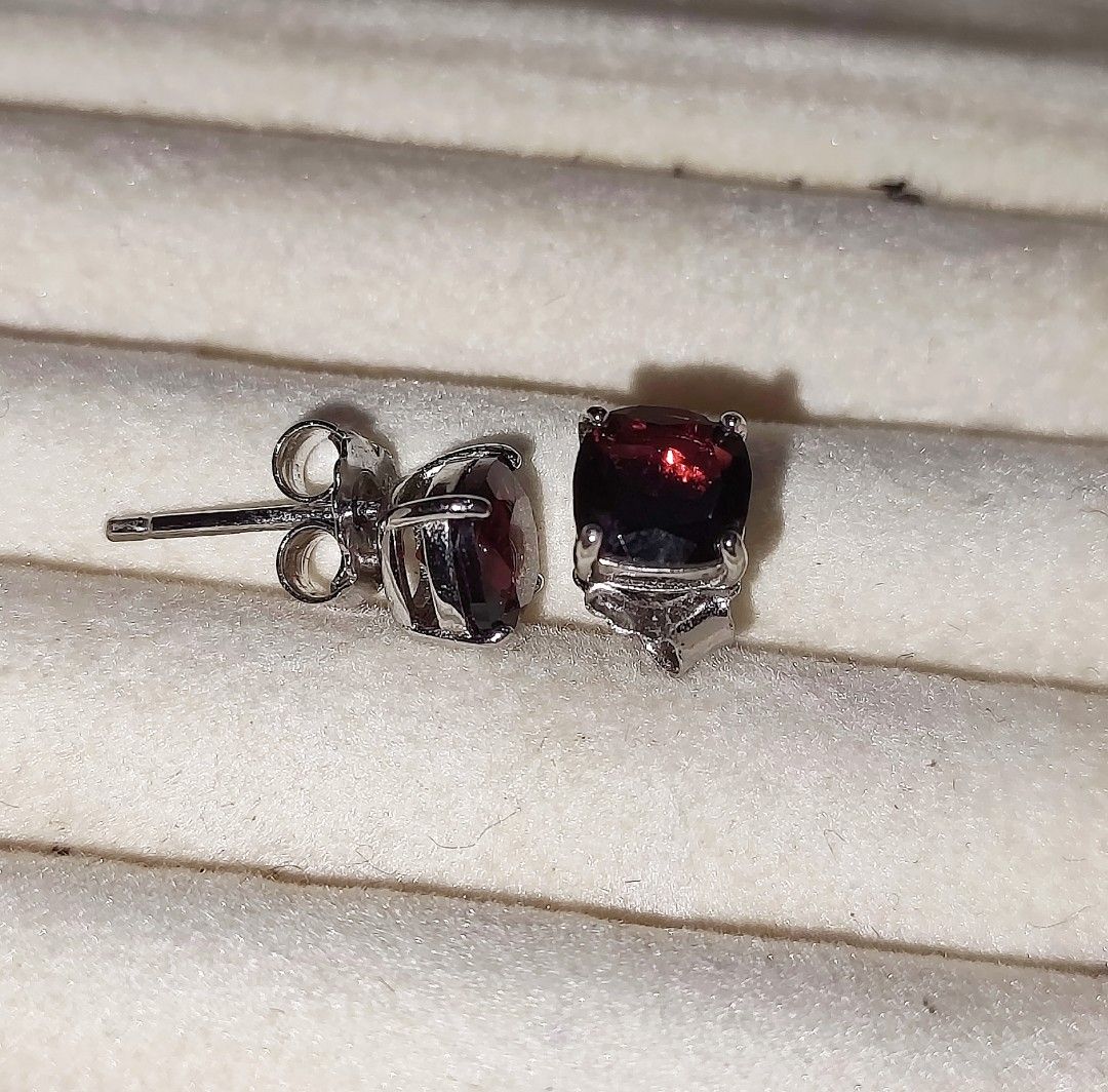 Silver Garnet Stone Stud Earrings (Category: Earrings) located in Cavite. Submitted by noblepenguin_6c8662 (Listing ID 1467707446, Image 3). Description: - Elegant silver stud earrings - Features deep red cushion-cut garnet stones with a brilliant sparkle - Secure four-prong metal setting - Equipped with reliable butterfly backs - Versatile design, ideal for daily wear or gifting.