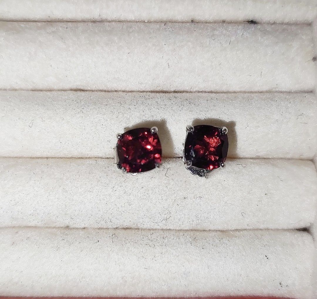 Silver Garnet Stone Stud Earrings (Category: Earrings) located in Cavite. Submitted by noblepenguin_6c8662 (Listing ID 1467707446, Image 2). Description: - Elegant silver stud earrings - Features deep red cushion-cut garnet stones with a brilliant sparkle - Secure four-prong metal setting - Equipped with reliable butterfly backs - Versatile design, ideal for daily wear or gifting.