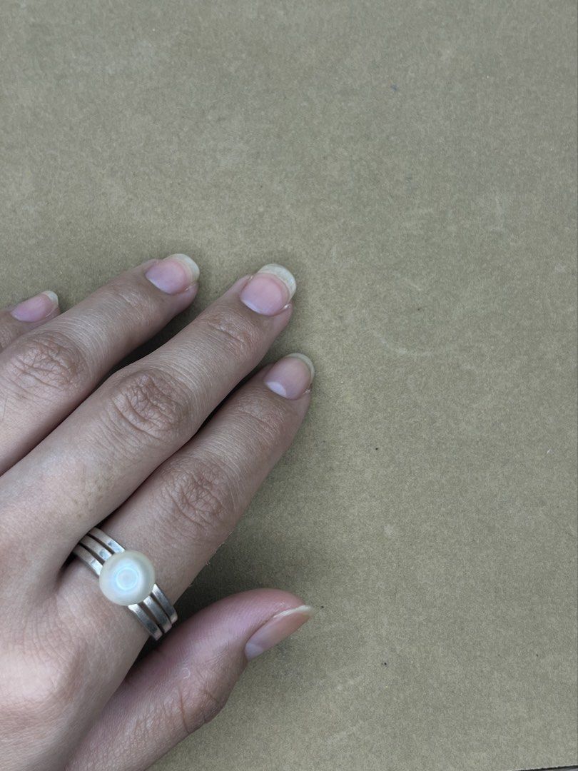 Silver Triple Band Ring with Pearl Accent (Category: Rings) located in Bulacan. Submitted by vintagetreasureby.mivida (Listing ID 1467641620, Image 2). Description: - Design: Trendy silver triple band ring with a single round pearl accent - Finish: Sleek, cool metallic look - Versatility: Ideal for daily wear or stacking with other rings - Fit: Standard sizing, lightweight, and very comfortable - Condition: Brand new and ready to ship.