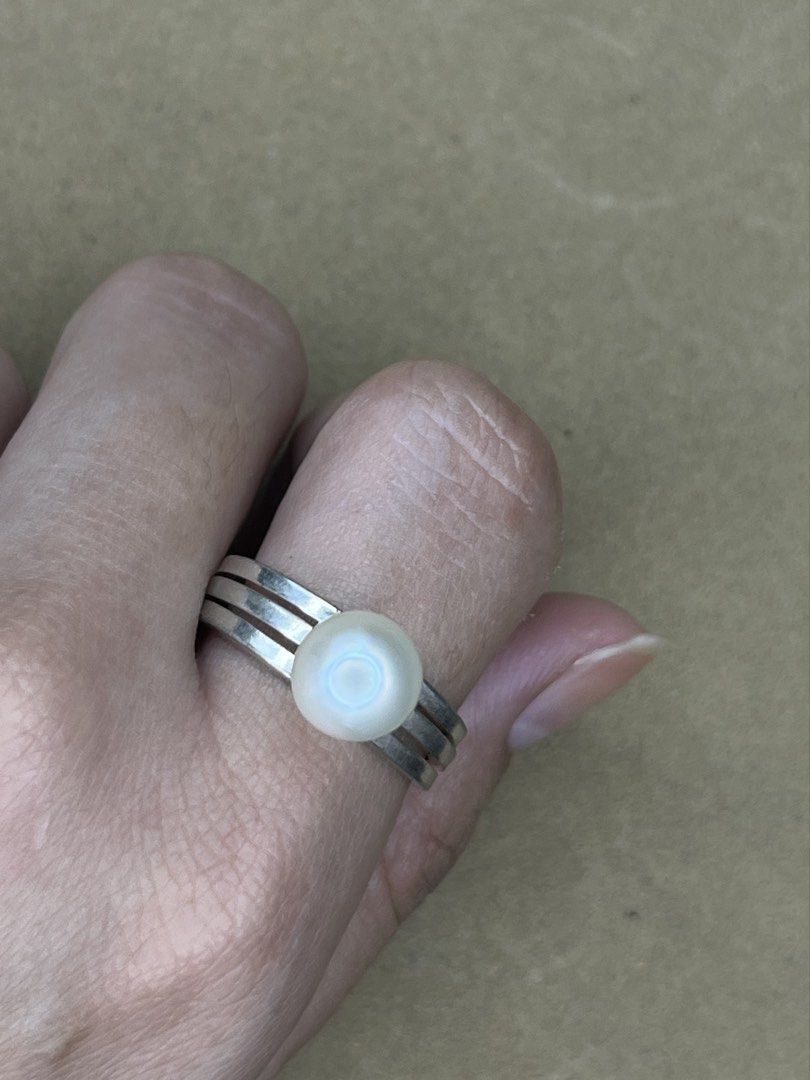 Silver Triple Band Ring with Pearl Accent (Category: Rings) located in Bulacan. Submitted by vintagetreasureby.mivida (Listing ID 1467641620, Image 1). Description: - Design: Trendy silver triple band ring with a single round pearl accent - Finish: Sleek, cool metallic look - Versatility: Ideal for daily wear or stacking with other rings - Fit: Standard sizing, lightweight, and very comfortable - Condition: Brand new and ready to ship.