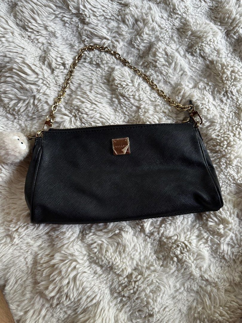 Sisley Black Shoulder Bag with Gold Chain (Category: Shoulder Bags) located in Digos. Submitted by venusacaro13427 (Listing ID 1467603326, Image 1). Description: - Brand: Sisley - Material: Textured faux leather (Black) - Hardware & Strap: Gold-tone hardware with chain strap - Closure: Top zip closure - Interior: Branded fabric lining with 1 zippered pocket - Condition: Clean interior and exterior - Size: Compact, ideal for daily essentials.