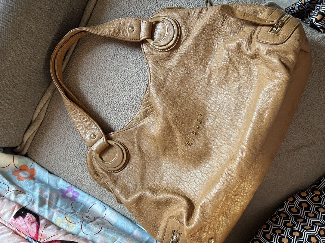 Sisley Brown Leather Shoulder Bag (Category: Shoulder Bags) located in Cavite. Submitted by florabells (Listing ID 1467695738, Image 2). Description: Y2k Sisley leather bag Condition: 8/10.