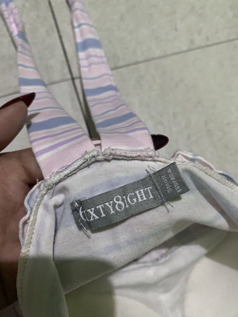SIXTY8IGHT Striped Halter Dress Size Small (Category: Dresses) located in Manila. Submitted by jaythrifttz (Listing ID 1467767977, Image 2). Description: - Brand: SIXTY8IGHT - Size: Small - Design: Pink, blue, and white vertical stripes on the skirt, horizontal stripes on the bodice - Details: Halter neck with adjustable tie straps - Material: Soft cotton, lightweight and comfortable for warm weather - Condition: Excellent.