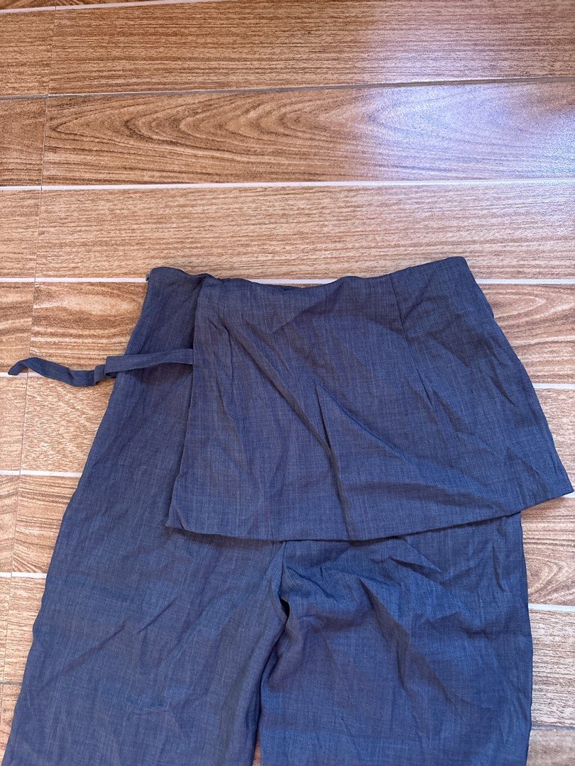 Skort Pants with Side Buckle Detail (Category: Skirts) located in Manila. Submitted by _foryou (Listing ID 1467672627, Image 3). Description: - Color: Dark Grey - Style: Straight-leg trousers with attached wrap skirt overlay dm for when worn! used only once.
