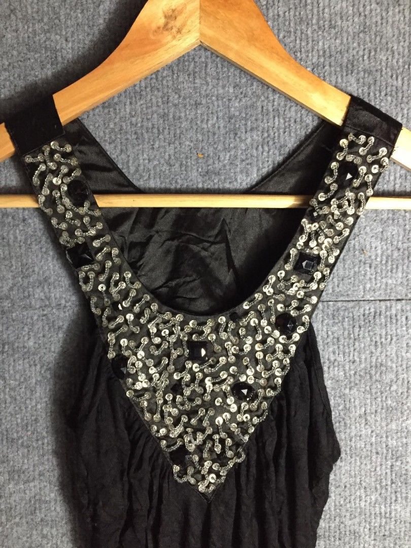 Sleeveless sequin and beaded (Category: Sleeveless) located in Manila. Submitted by bai.n.sell (Listing ID 1467654295, Image 2). Description: Sleeveless sequin and beaded Size: Small-xsmall - Good Condition ✨ THRIFTED ITEMS — PLEASE MANAGE YOUR EXPECTATIONS! All items are thrifted, so please expect possible signs of use. Colors may also vary slightly due to lighting and camera settings..