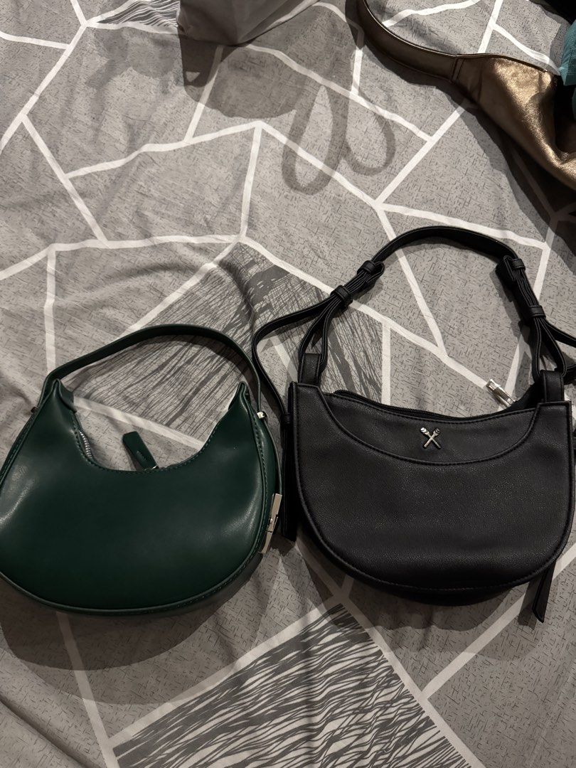 Small Bag Bundle (Black and Emerald Green) (Category: Shoulder Bags) located in Paranaque City. Submitted by matildascatalog (Listing ID 1467729788, Image 1). Description: - Regatta small black crescent shoulder bag - Adjustable strap with multiple holes for a customized fit - Secure top main zip closure - Lined fabric interior with an extra zippered pocket for organization - Small Emerald Green shoulder bag purchased from Tiktok - Secure double 