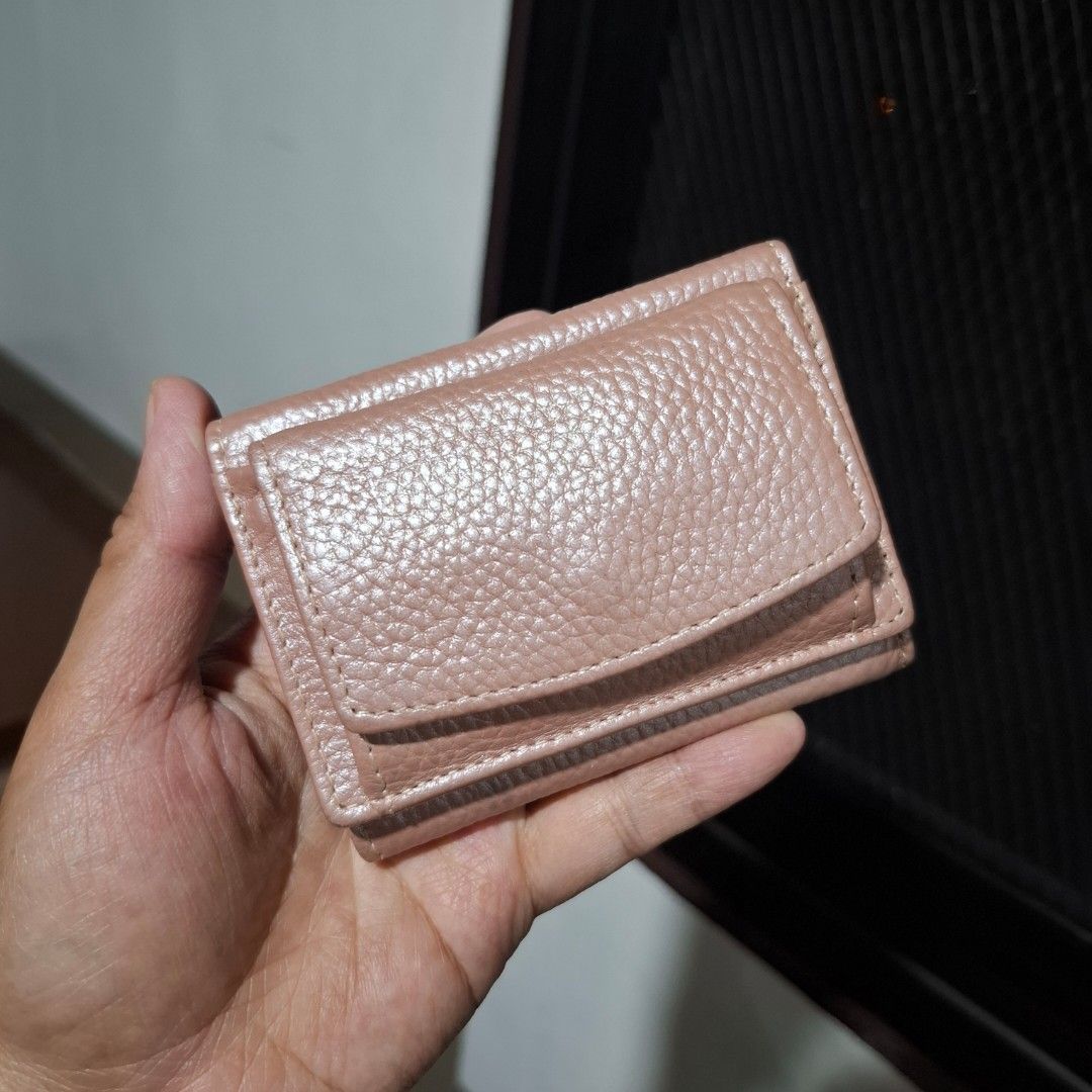 Small Trifold Wallet (Free SF) (Category: Wallets & Card holders) located in Baguio. Submitted by bycharmaebuys (Listing ID 1467724763, Image 1). Description: No brand ‼️ SALE PRICE: 390.00, FREE SHIPPING NATIONWIDE‼️ First to pay basis Small Size, trifold Dimension: 9.5 x 7 (cm) Leather Material Metallic pink color 6 card slots, single bill compartment Coin compartment Handy and compact No flaws, like new No reservation, all items are available 