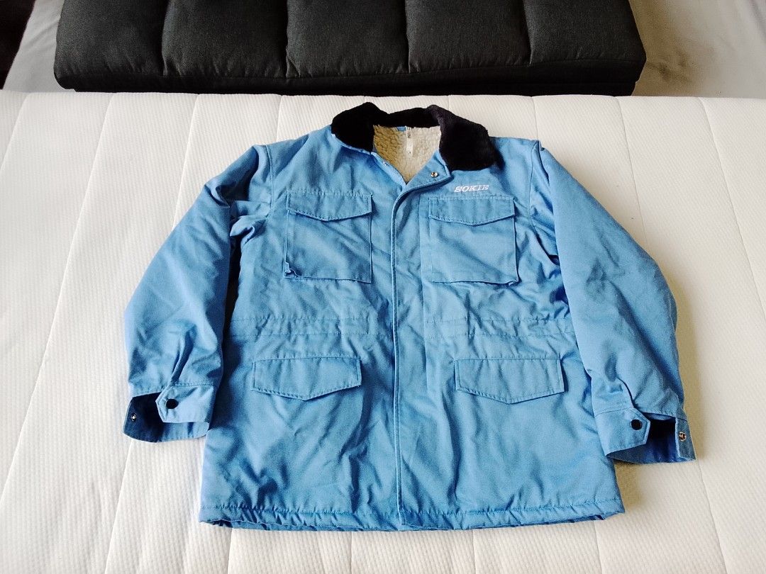 SOKIE 1990s fleece lined utility work jacket (Category: Coats, Jackets and Outerwear) located in Manila. Submitted by newage.vintage (Listing ID 1467652861, Image 1). Description: - Vintage SOKIE blue winter jacket with Sherpa lining / workwear parka - Condition: excellent vintage / pre owned condition -Hardware: smooth gliding YKK zipper and heavy duty snap buttons - Lining: Super warm and cozy thick faux Sherpa / fleece lining throughout the in