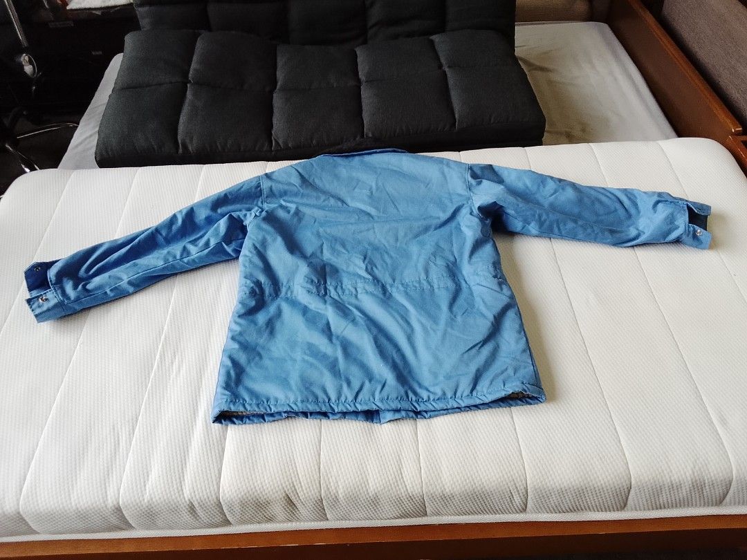 SOKIE 1990s fleece lined utility work jacket (Category: Coats, Jackets and Outerwear) located in Manila. Submitted by newage.vintage (Listing ID 1467652861, Image 3). Description: - Vintage SOKIE blue winter jacket with Sherpa lining / workwear parka - Condition: excellent vintage / pre owned condition -Hardware: smooth gliding YKK zipper and heavy duty snap buttons - Lining: Super warm and cozy thick faux Sherpa / fleece lining throughout the in