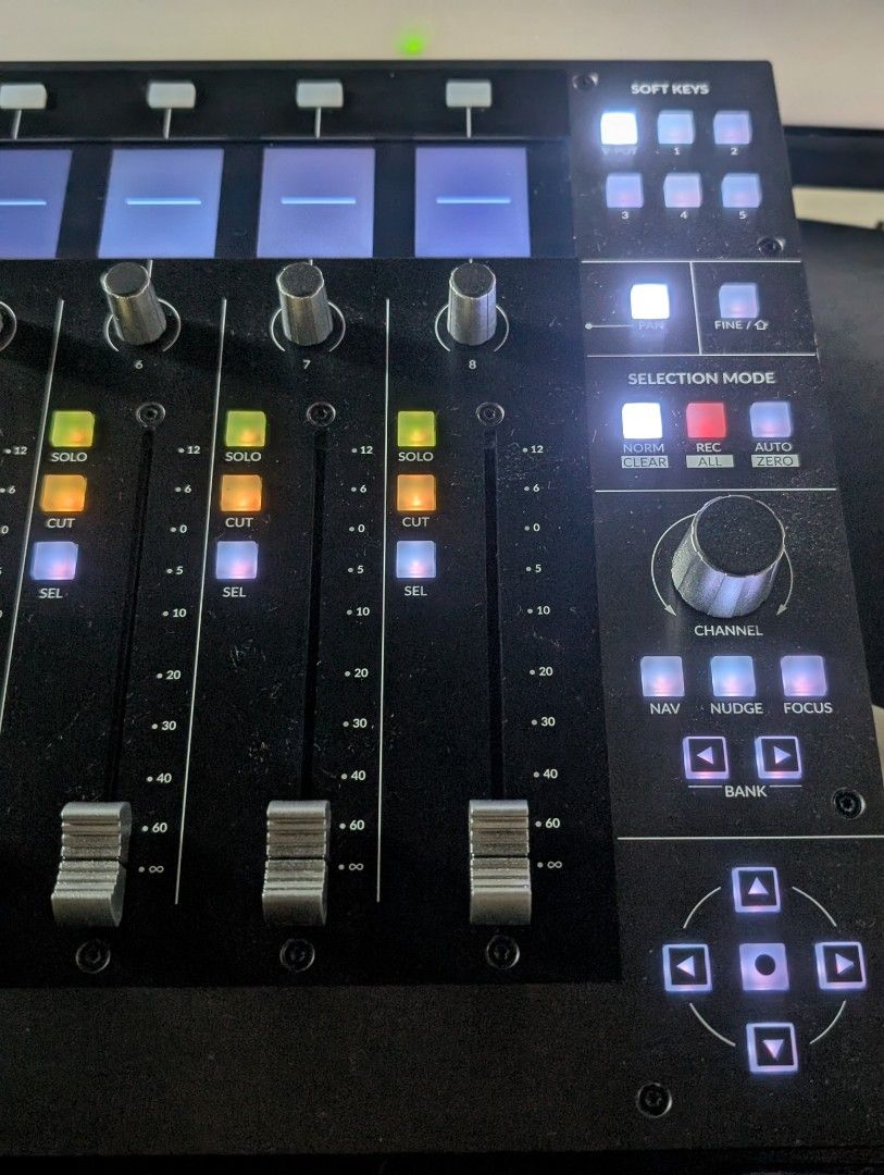 Solid State Logic SSL UF8 Studio Controller (Category: Musical Instruments) located in Singapore. Submitted by dustoutmud (Listing ID 1467688715, Image 4). Description: Solid State Logic UF8 advanced DAW controller. Eight touch-sensitive motorized faders, multi-purpose encoder knobs, color TFT displays for track feedback. Automation controls including read, write, touch, and latch modes. Soft keys section and bank navigation buttons. Built-in SSL