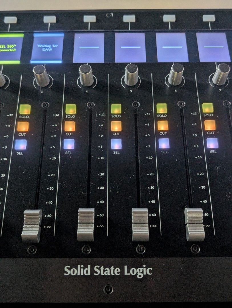 Solid State Logic SSL UF8 Studio Controller (Category: Musical Instruments) located in Singapore. Submitted by dustoutmud (Listing ID 1467688715, Image 3). Description: Solid State Logic UF8 advanced DAW controller. Eight touch-sensitive motorized faders, multi-purpose encoder knobs, color TFT displays for track feedback. Automation controls including read, write, touch, and latch modes. Soft keys section and bank navigation buttons. Built-in SSL